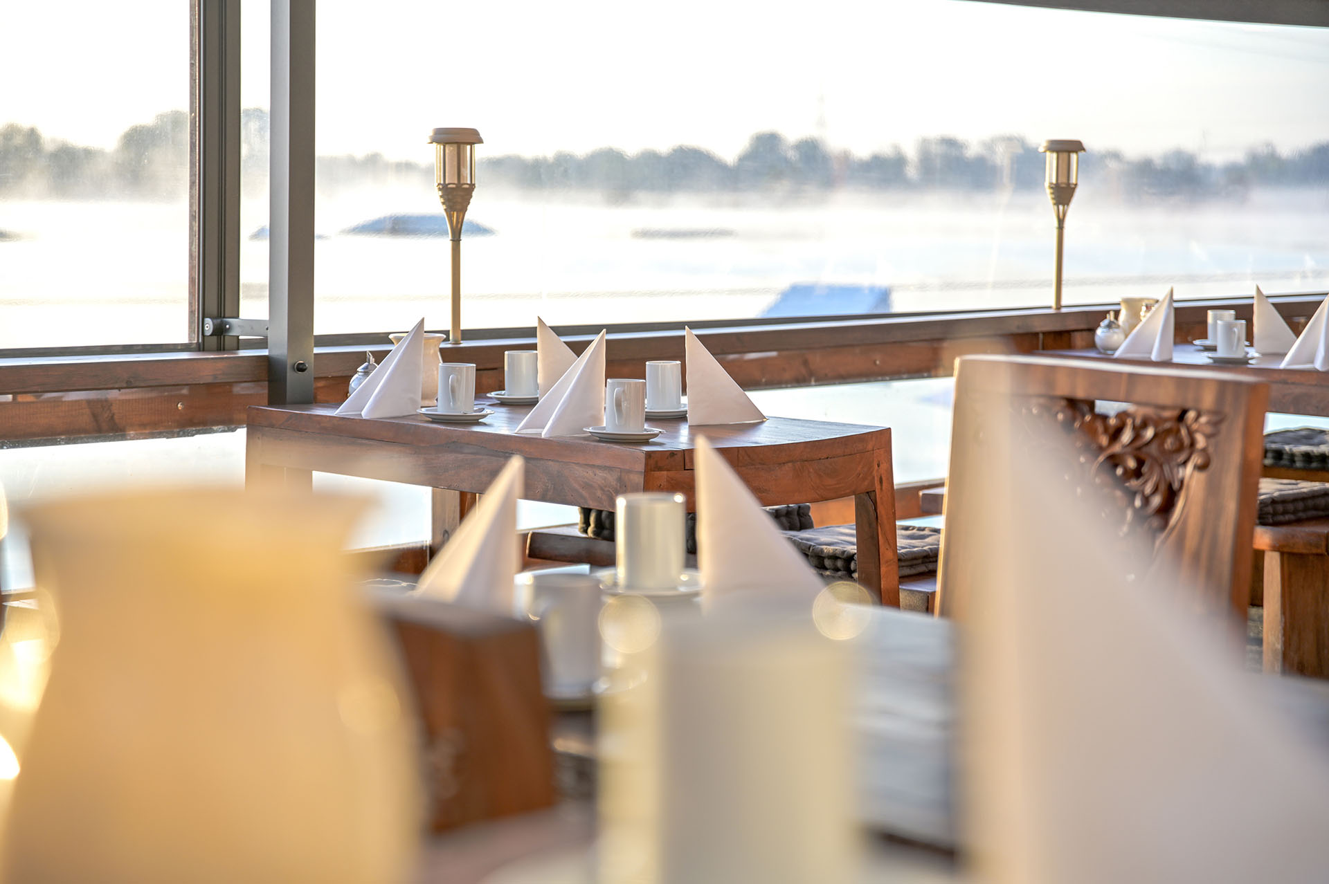 Der Outdoorbereich des Restaurant Eisvogel ist wind- und wetterfest, damit die Gäste auch wenn das Wetter nicht ganz so gut ist die tolle Atmosphäre und die Leckereien genießen können.